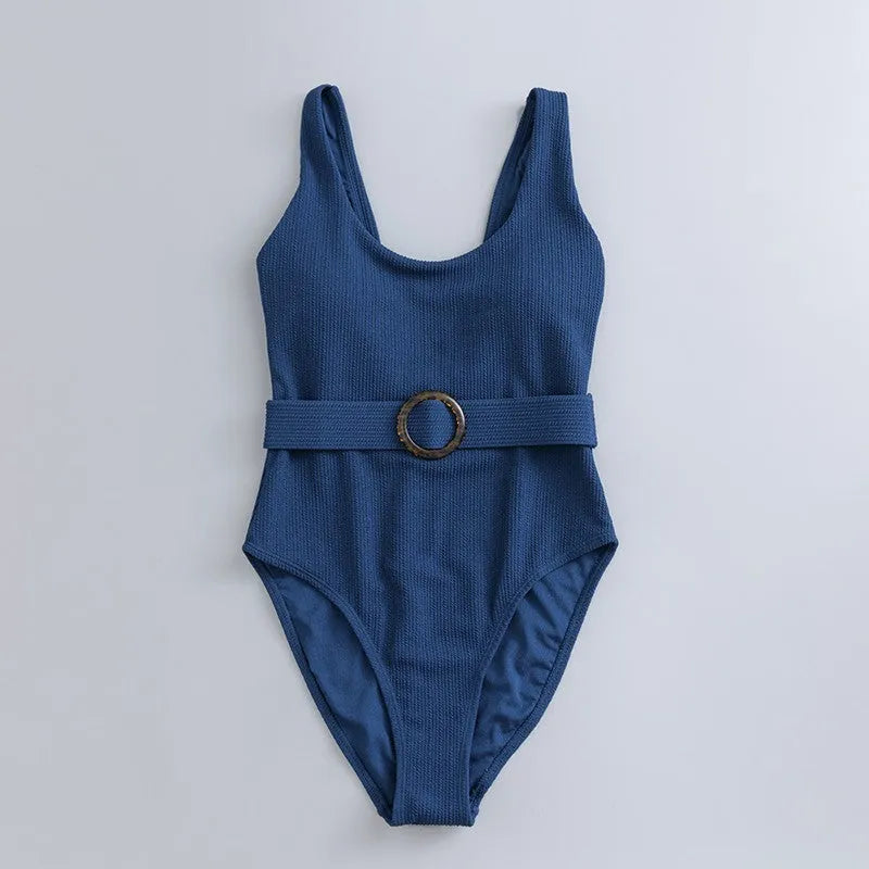 Navy blue women's one-piece swimsuit with triangular chest shape and integrated chest pads