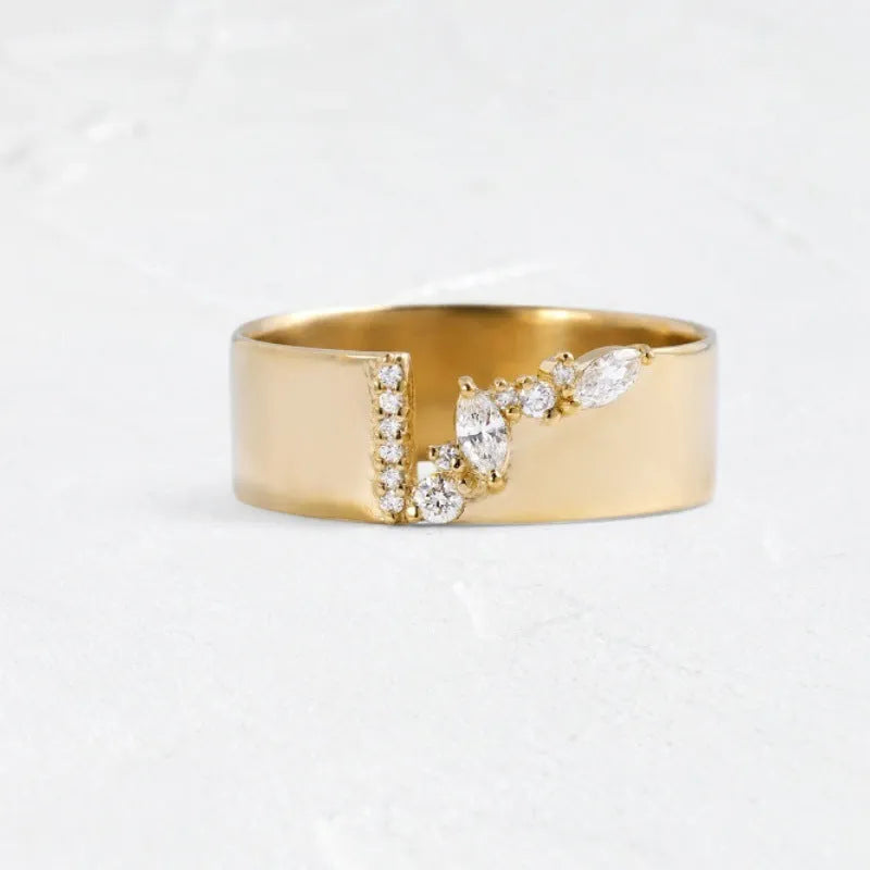 Gold electroplated women's ring with zircon accent on copper band