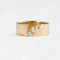Gold electroplated women's ring with zircon accent on copper band