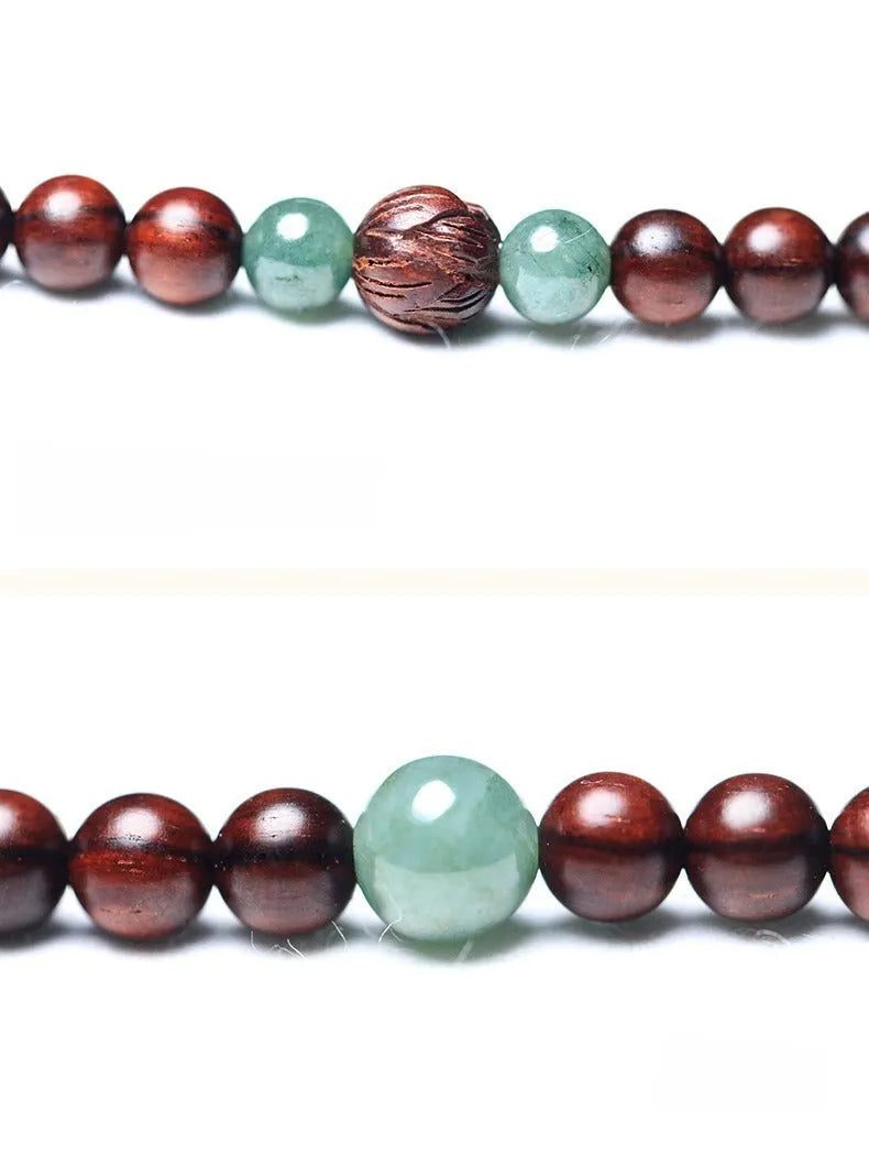 Rosewood bead bracelet with a carved wooden pendant, shown in Indian and Zambia rosewood colour options.