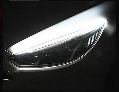 Car LED daytime running light strip with flowing turn signals in silicone waterproof construction