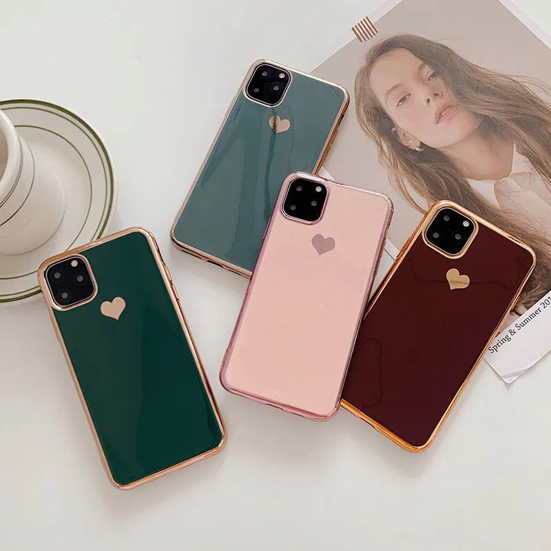Solid colour TPU back cover phone case for iPhone, shown in blue, claret, pink, or green.