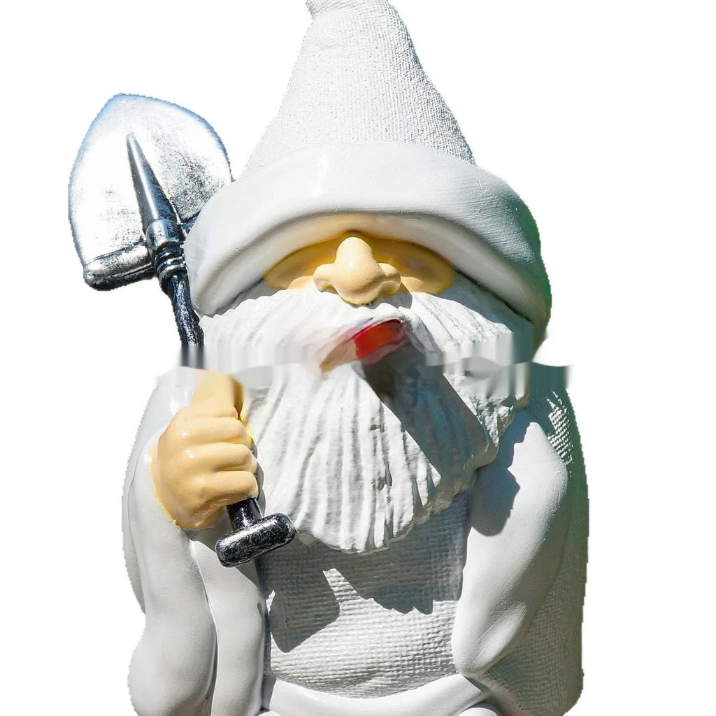 A small resin and plastic Smoking Shovel Dwarf ornament for Christmas garden decoration.