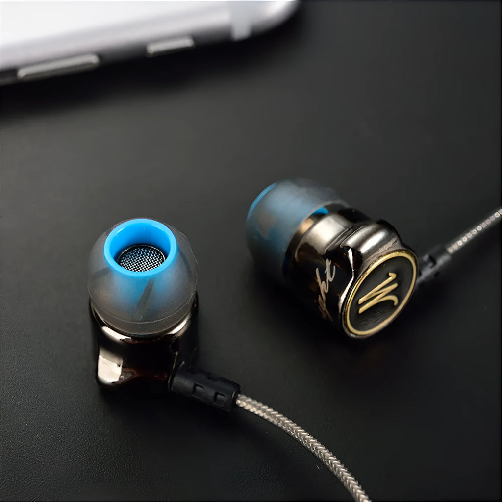 DM7 in-ear headphones in black with silicone earplugs and TPE cable, side view