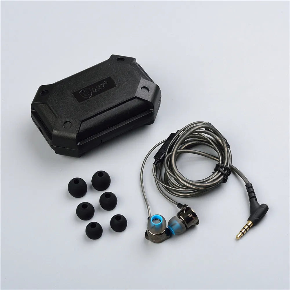 DM7 in-ear headphones in black with silicone earplugs and TPE cable, side view