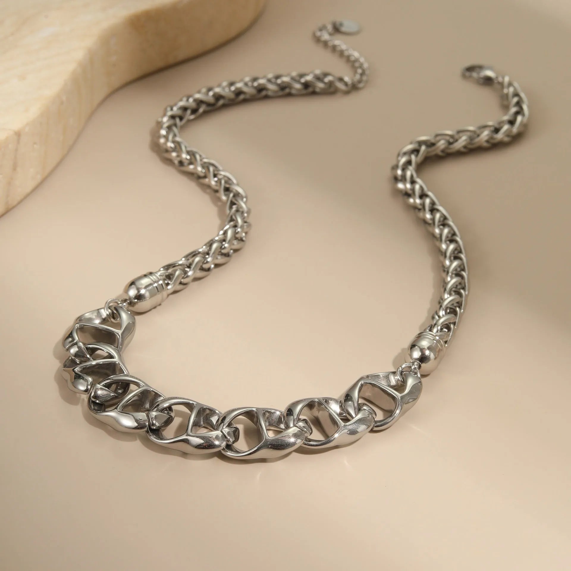 Women's stainless steel necklace with geometric pendant and gold plating in two colour options