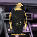 Eagle style wireless charging car phone holder with suction cup mount in black and gold colour.