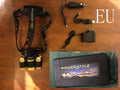 Gold LED head torch with adjustable headband, zoom lens, and sensor switch on the front housing.