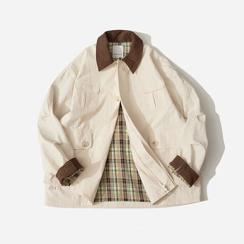 Casual jacket in contrasting colour block design with side seam pockets and long sleeves