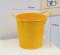 Round metal pen holder for desktop organisation, shown in available colour options including green, pink, and red.