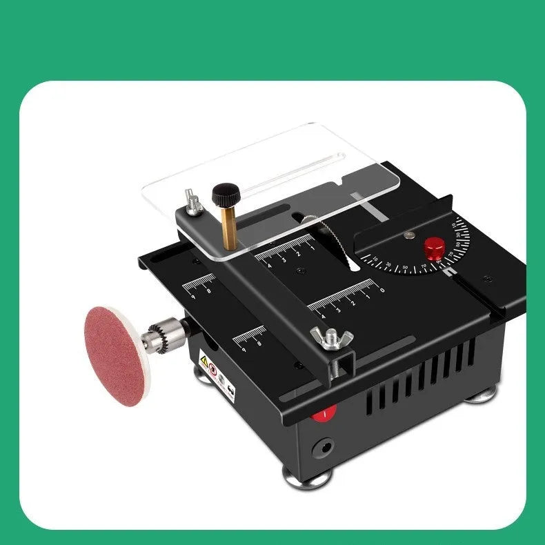 Compact metal cordless desktop saw with lithium battery on a workbench