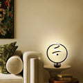 Black musical note shaped Bluetooth RGB lamp with remote control for bedside or sofa lighting.