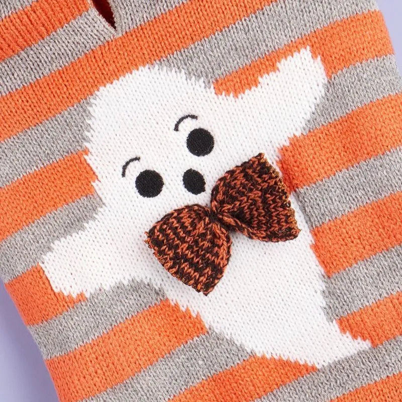 Orange and black striped knitted hooded sweater for dogs or cats with fur ball details.