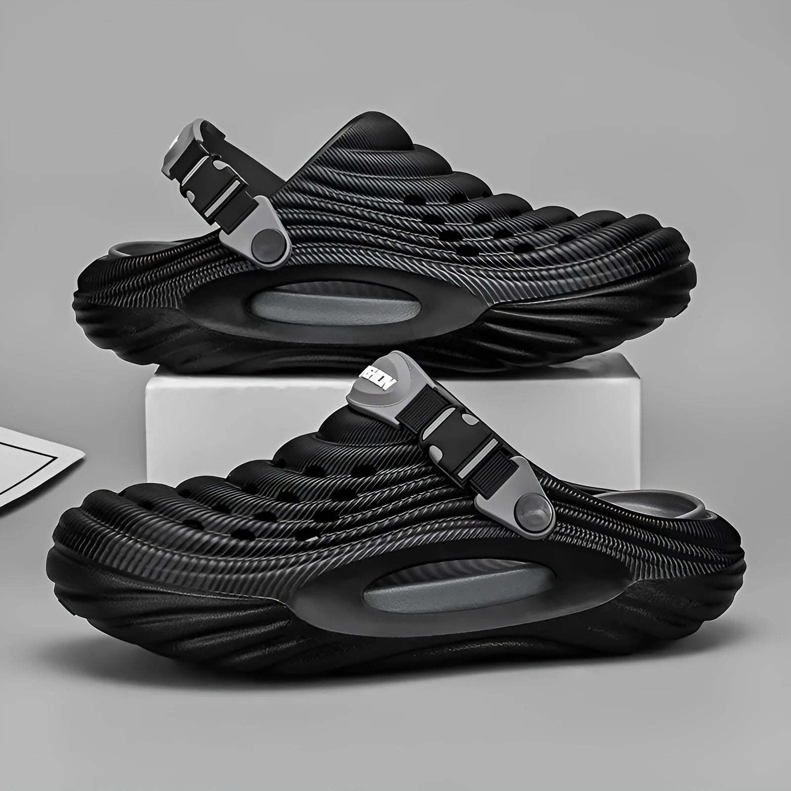 Men's black EVA casual slippers with hollow out pattern and platform sole
