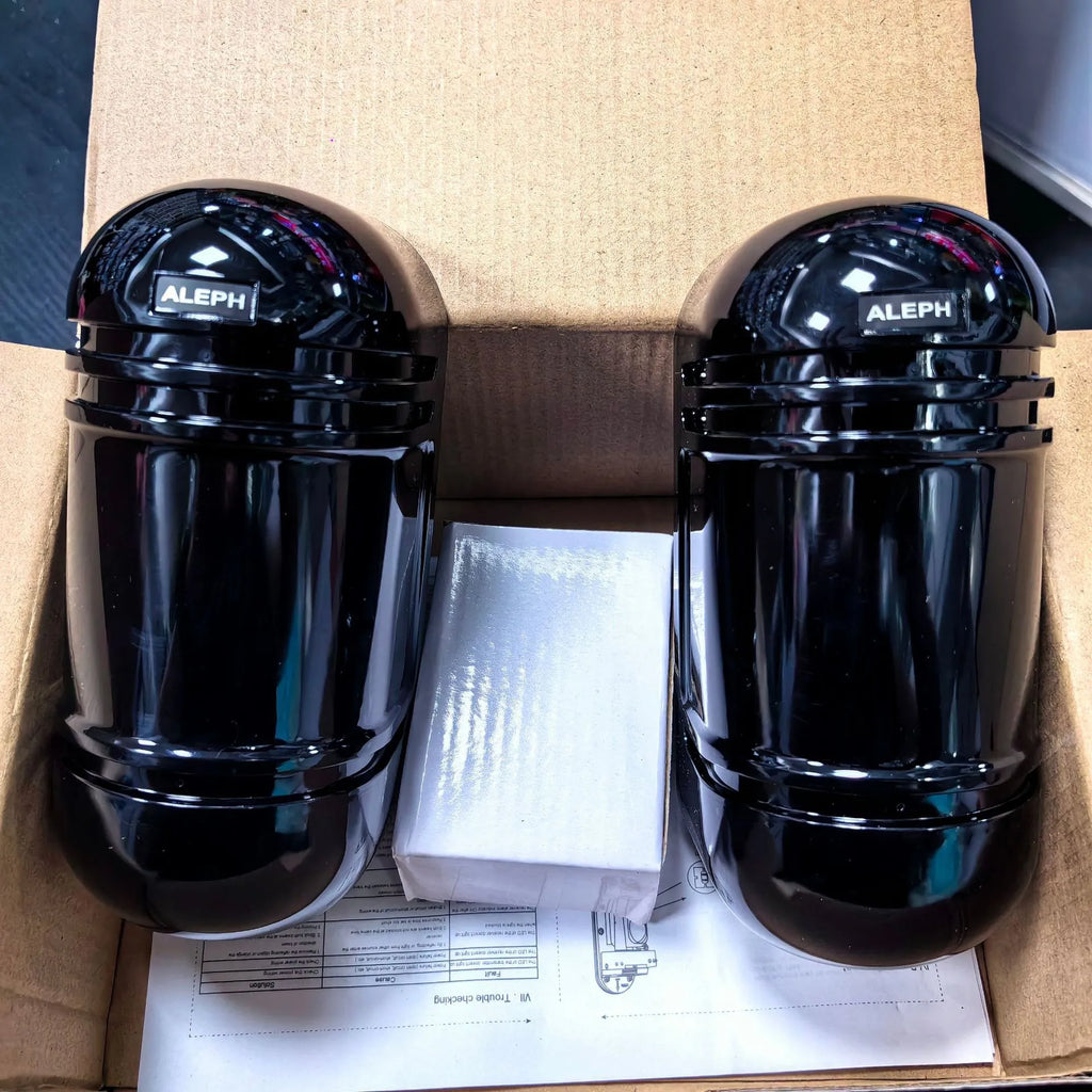 Black infrared security detector with wired connections for perimeter alarm systems