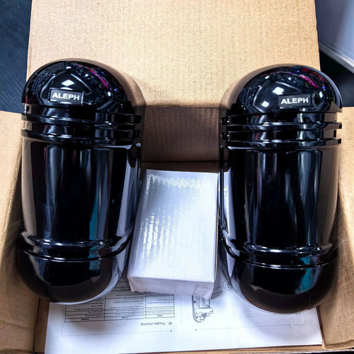 Black infrared security detector with wired connections for perimeter alarm systems