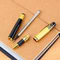 Black metal fountain pen with iridium nib and patterned orb design, shown on a desk