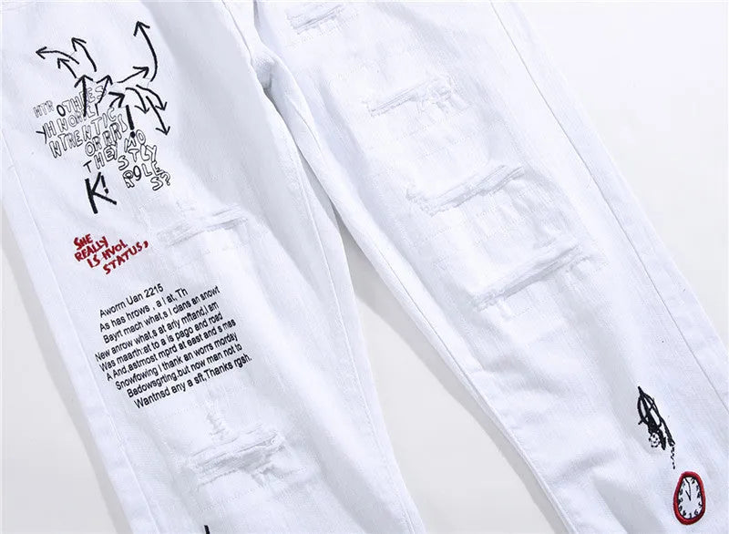 White shredded embroidery jeans in cotton denim, sizes 29-38, with ripped and embroidered details.