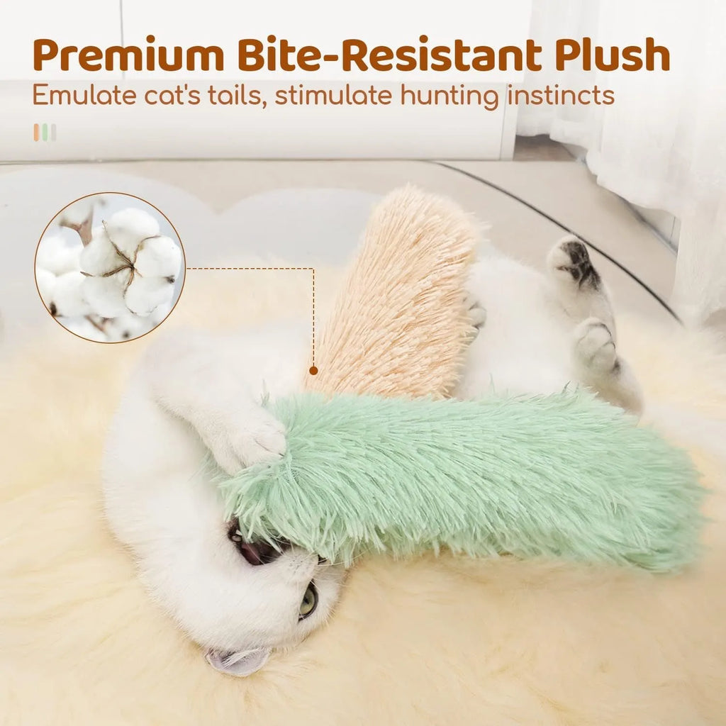 Plush cat toy pillow in green, white, blue, and pink colours measuring 27cm by 10cm