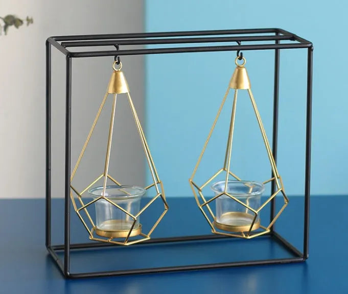 Set of six Nordic iron candle holders in various styles for block candles on a wooden shelf