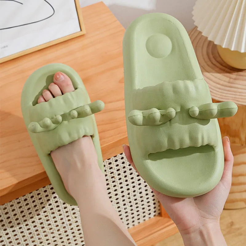 Women's deer horn pattern EVA flip-flop slippers in light yellow, showing hollow-out design and textured sole.