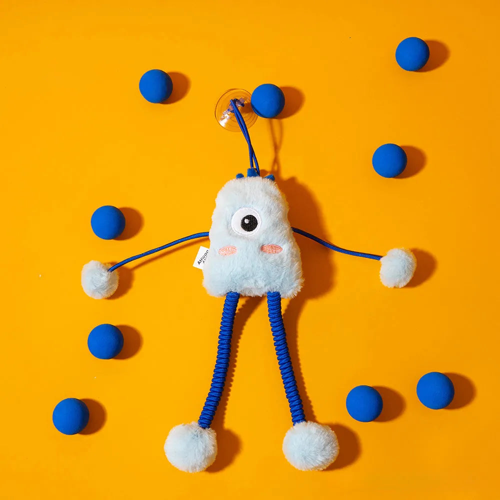 Blue plush cat toy with a telescopic elastic rope and a mint-coloured bell ring on a white surface.