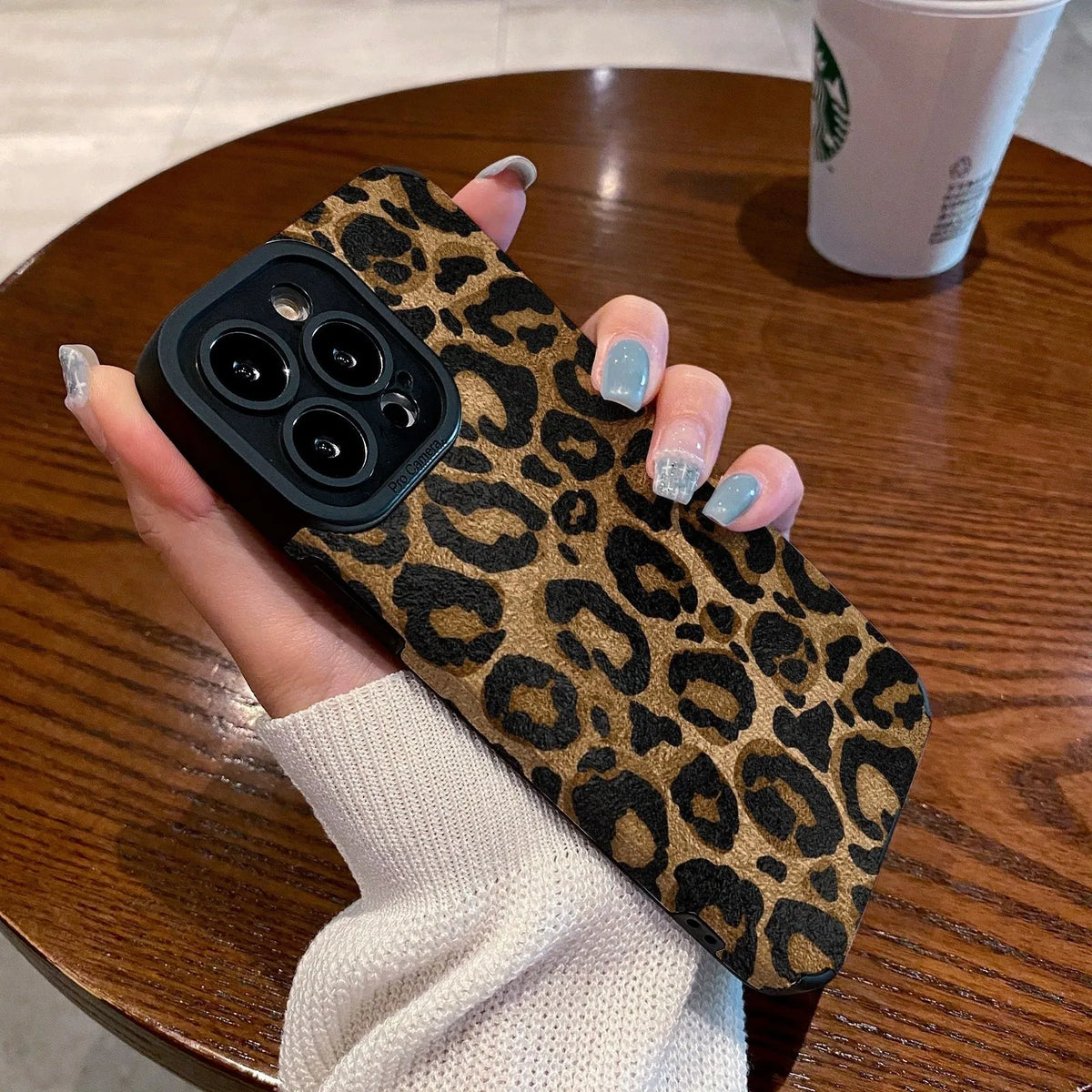 Cartoon phone case in gold leopard print imitation leather, all-inclusive design for iPhone.
