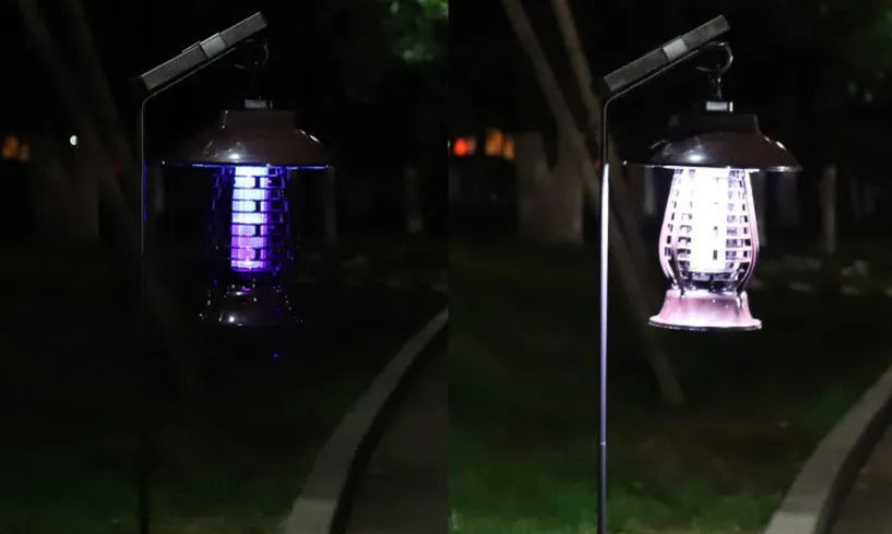 White and black solar-powered mosquito lamp with solar panel on top for outdoor garden use.