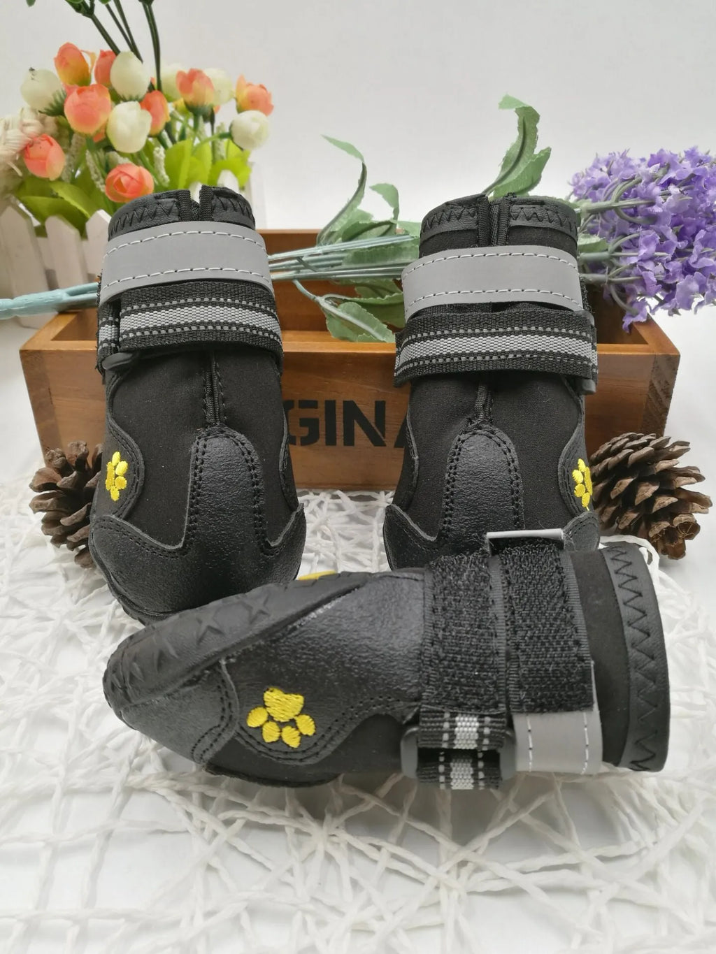 Black waterproof dog shoes with non-slip PVC sole, adjustable fuzzy belt