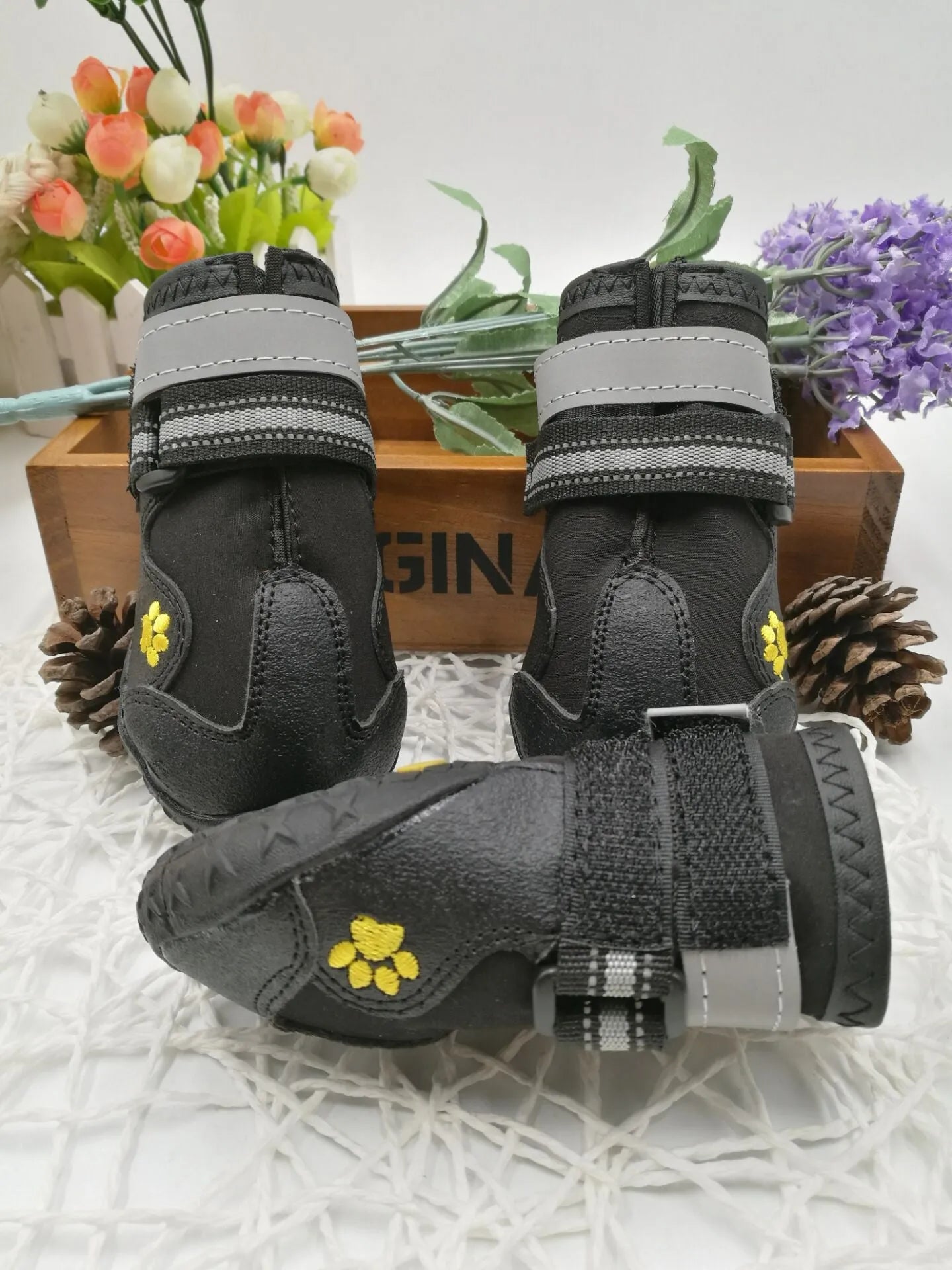 Black waterproof dog shoes with non-slip PVC sole, adjustable fuzzy belt