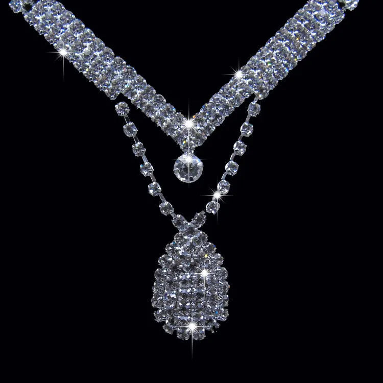 Water drop rhinestone bridal necklace and earrings set on silver tone base for weddings and formal events