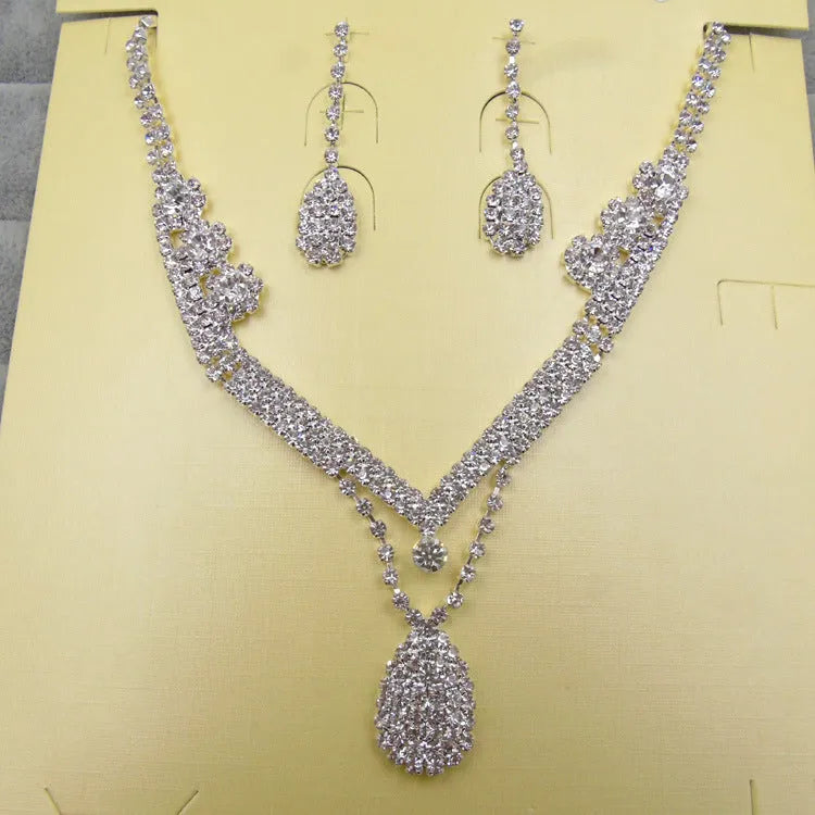 Water drop rhinestone bridal necklace and earrings set on silver tone base for weddings and formal events