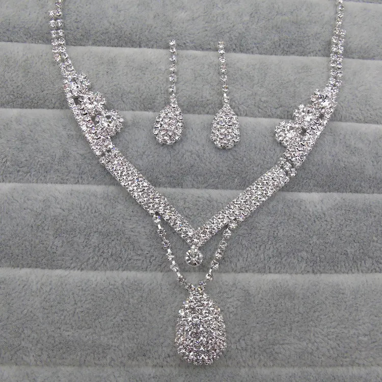 Water drop rhinestone bridal necklace and earrings set on silver tone base for weddings and formal events