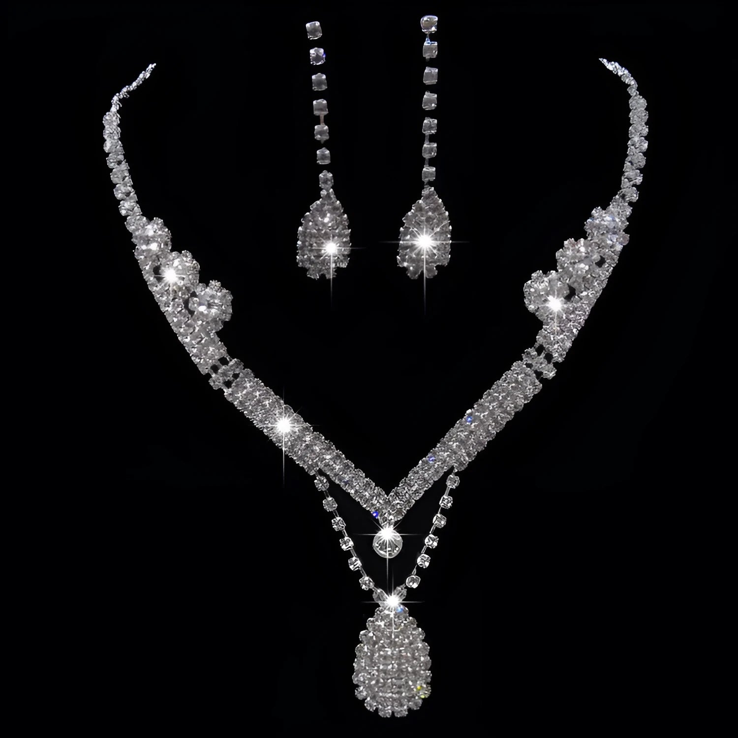 Water drop rhinestone bridal necklace and earrings set on silver tone base for weddings and formal events