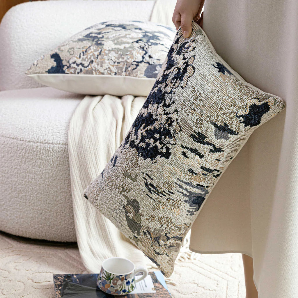 Antique blue Chinese style floral pattern cushion on a sofa