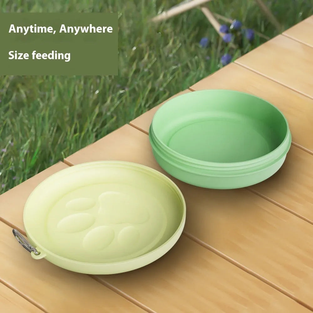 A collapsible portable dog bowl in light pink or green, shown in Small and Large sizes.