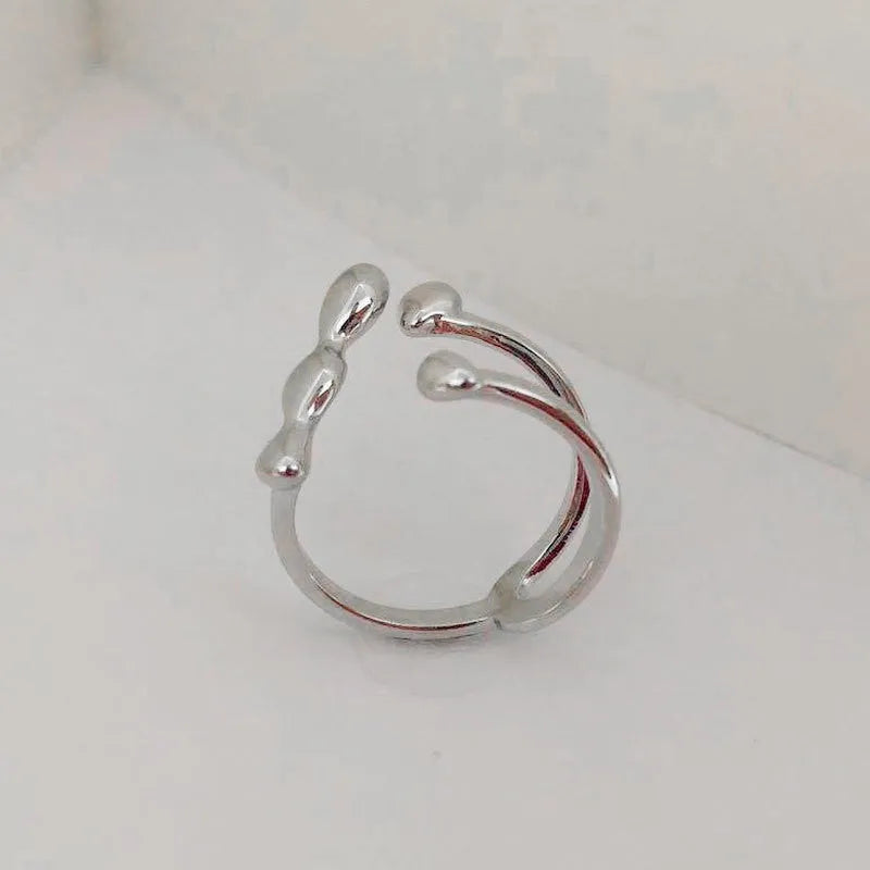 Brass spherical fashion ring in gold or silver colour for women