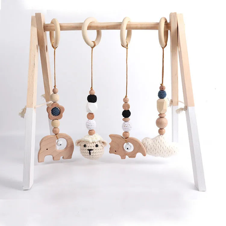 Beech wood baby rattle toy with animal decoration, 28cm long, available in six colours