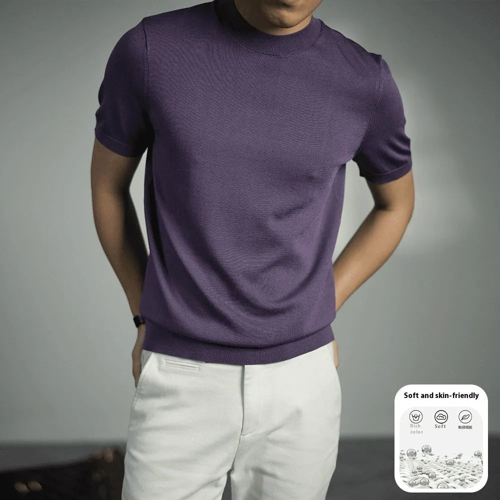 Man wearing a silver grey knitted round neck t-shirt with short sleeves.