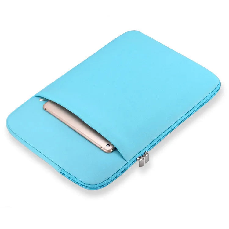 Canvas laptop sleeve in grey with zipper opening and internal pockets for computer and accessories