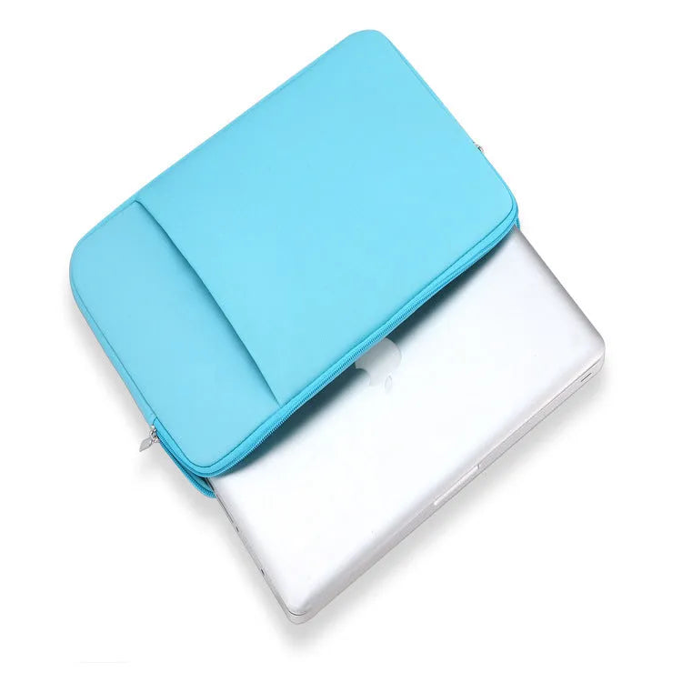 Canvas laptop sleeve in grey with zipper opening and internal pockets for computer and accessories
