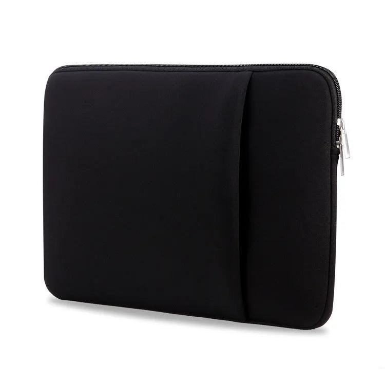 Canvas laptop sleeve in grey with zipper opening and internal pockets for computer and accessories