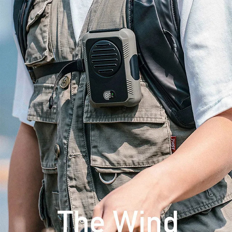 Green portable hanging neck fan for outdoor sports with USB charging cable.