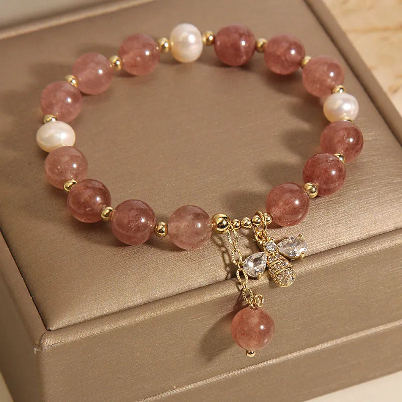 Women's pink strawberry quartz and freshwater pearl bracelet with zircon and alloy accents.