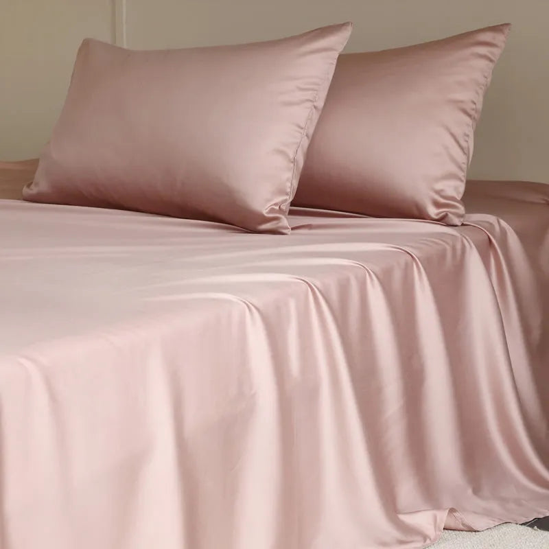 Light grey Tencel Lyocell bed sheet with twill weave, shown folded to display texture and solid colour.