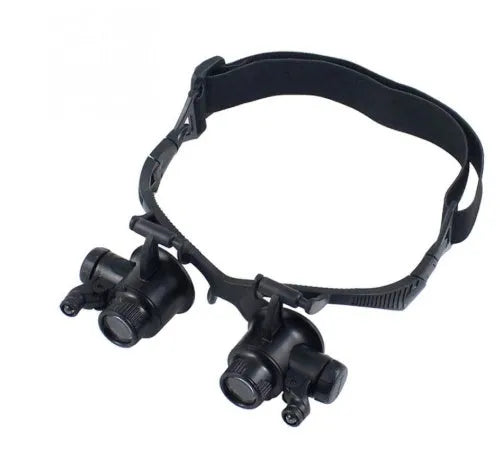 Black hands-free magnifying glasses with LED lights and multiple interchangeable lenses for precision repair work.