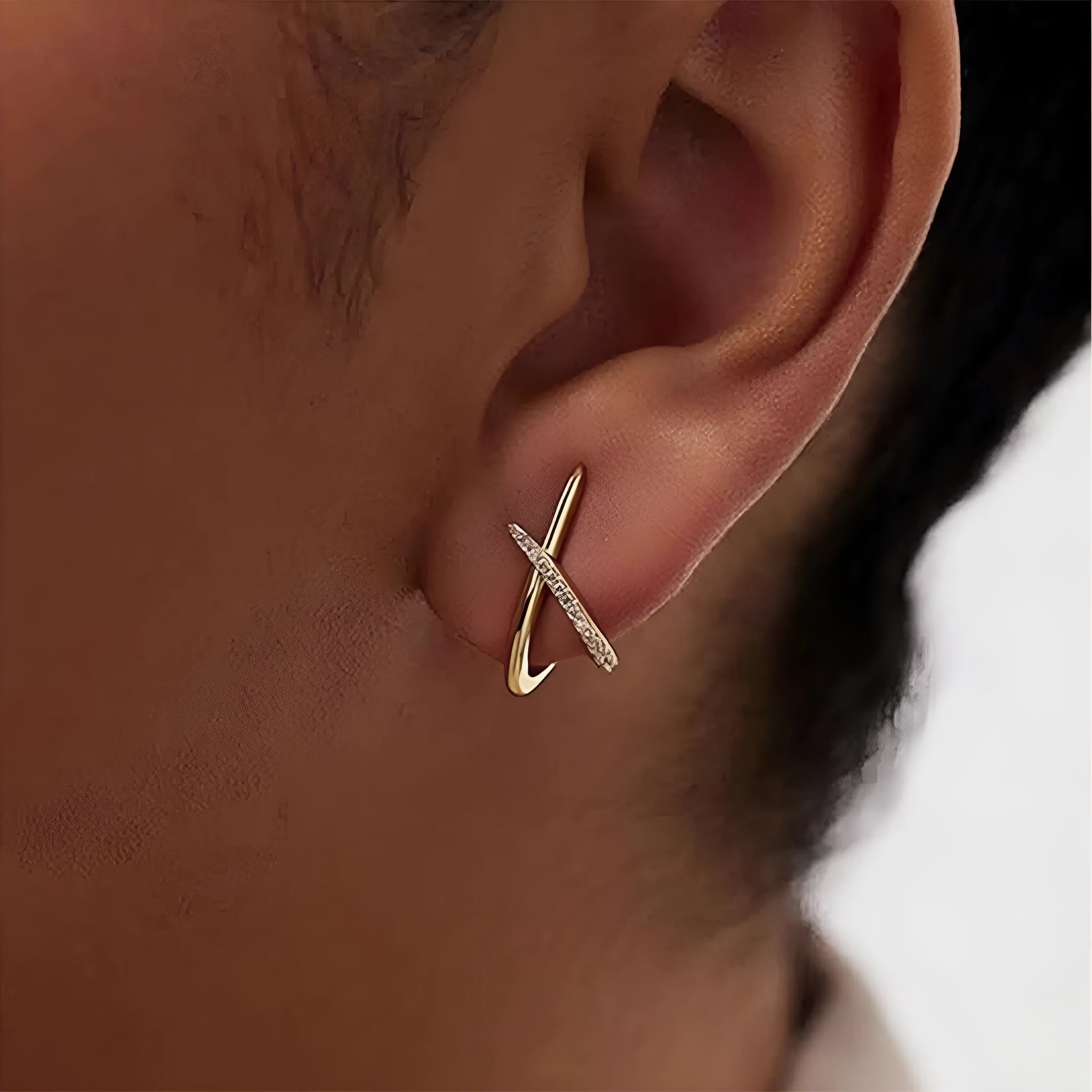 Zinc alloy geometric clip-on earrings in gold, silver, and rose gold on white background
