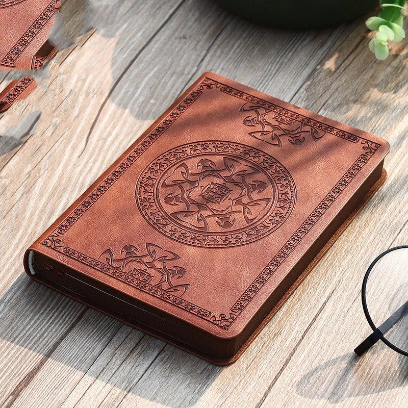 Portable mini A6 notebook with imitation leather cover and pen in black