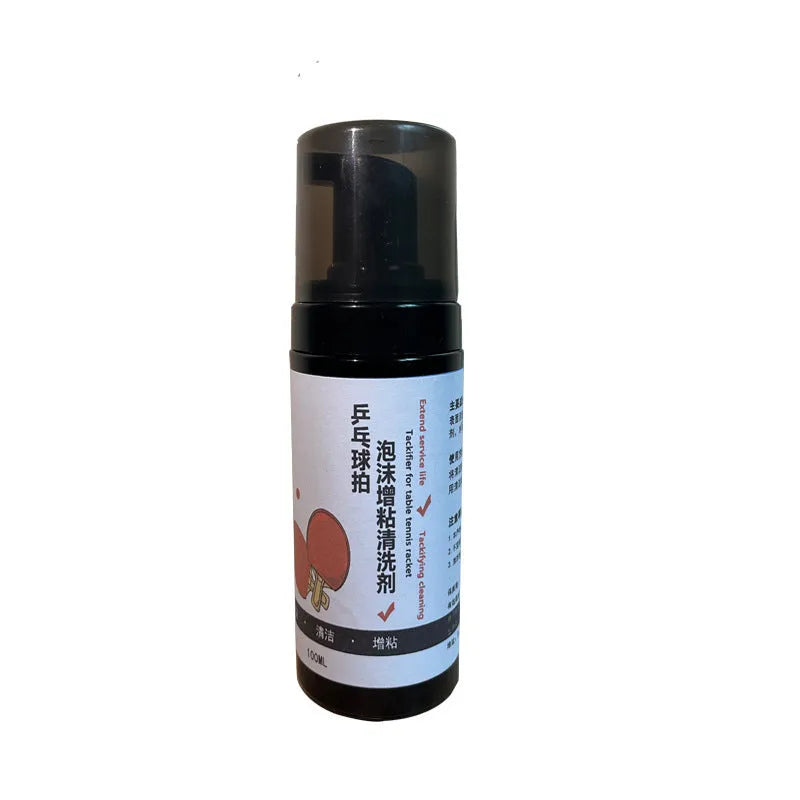 Table tennis racket cleaner kit with sponge mop, rubber cleaning agent bottle and protective film on table