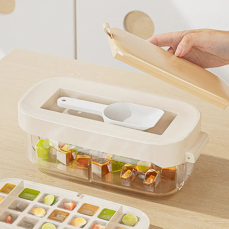 Food-grade plastic ice cube tray with grid, ice shovel, and storage compartment in blue colour.